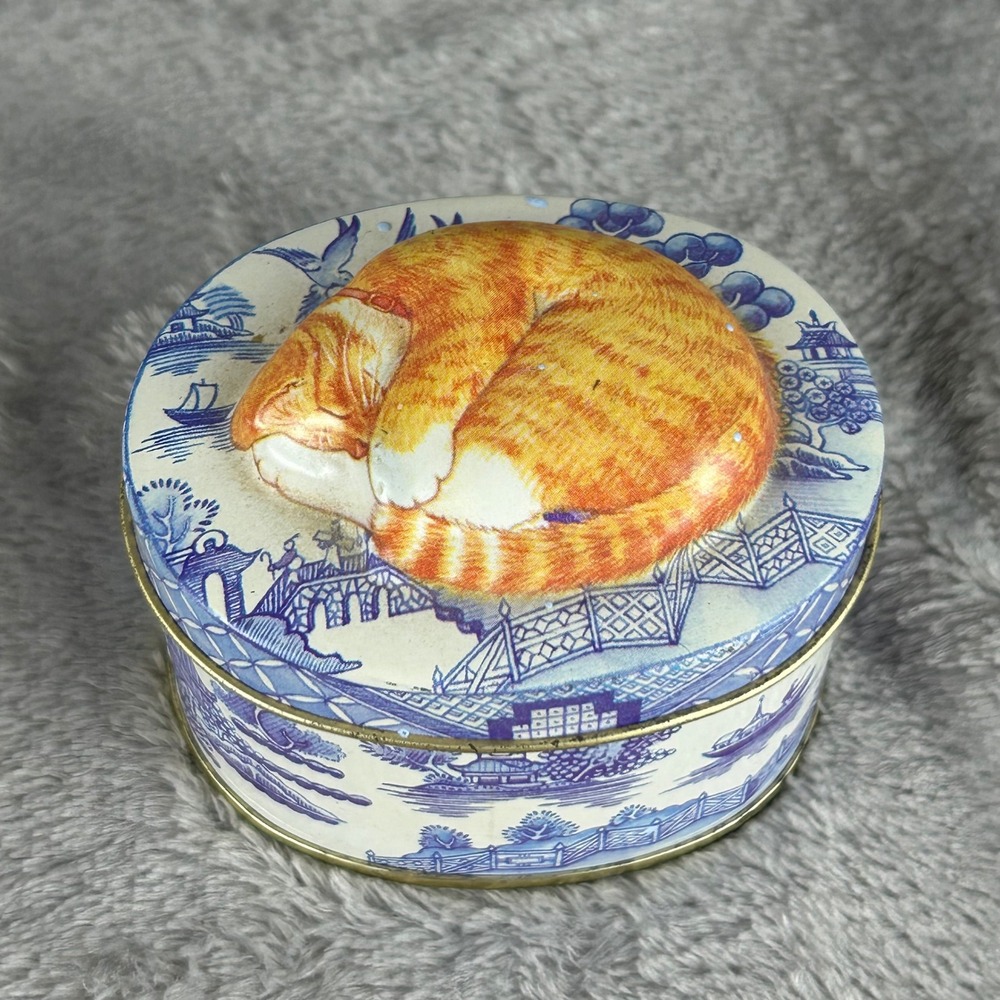 Vintage Blue Willow Style Oval Tin with Embossed Sleeping Orange Cat Lid